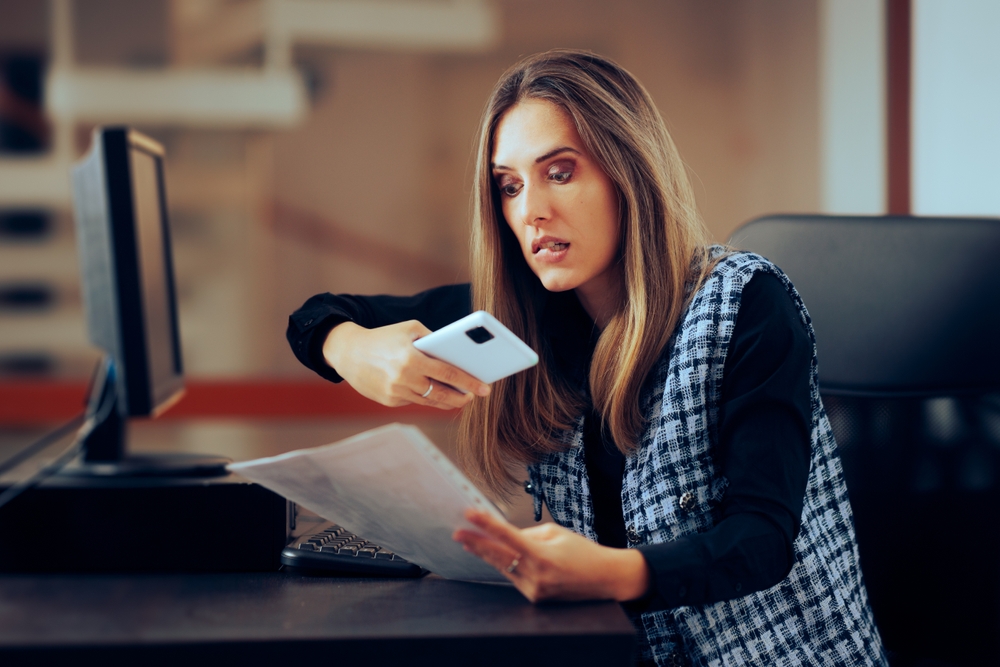 Woman Photographing Secret Documents at Work Corporate Espionage Style